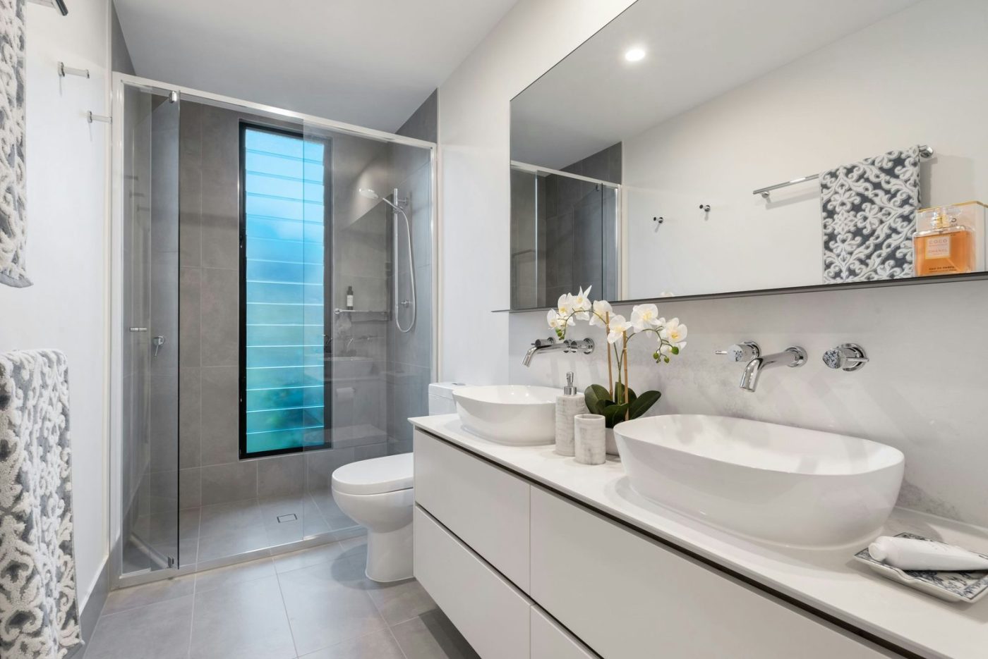 Modern bathroom with a walk-in shower and vanity