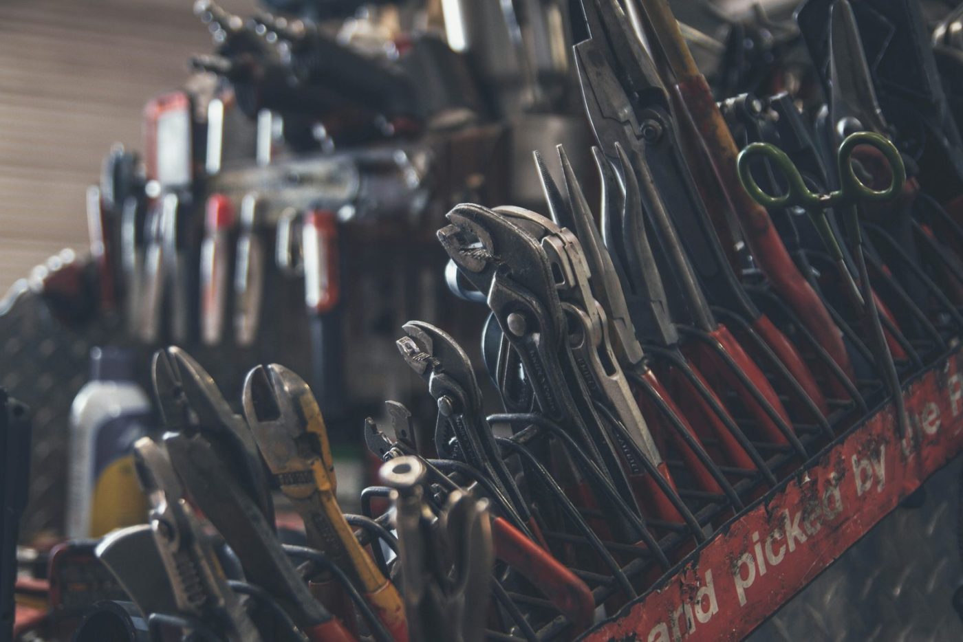 Wall of plumbing pliers and wrenches